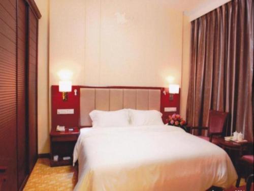 Cama o camas de una habitación en Nanning Yongzhou Hotel