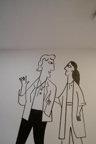 a drawing of two people walking together at Hotel Asrani International in Secunderabad