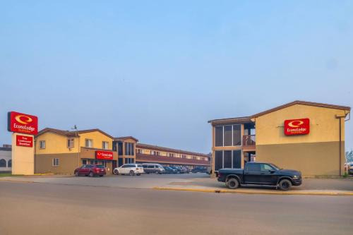 a truck parked in front of a gas station at Econo Lodge Inn & Suites High Level in High Level