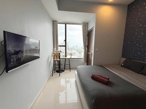 Televisyen dan/atau pusat hiburan di Oh, My Dear! Apartment - RiverGate