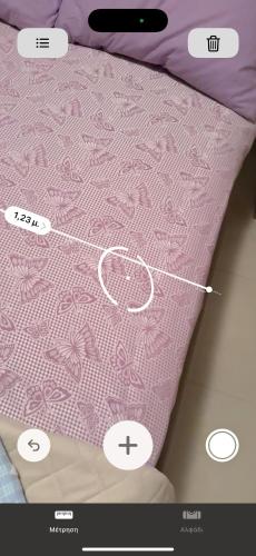 a picture of a pink bed with descriptions of the mattress at Villa GIANNAKOS MINOAN HERSONISSOS in Kastéllion
