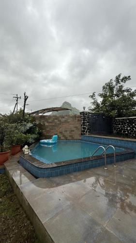 Piscina en o cerca de Skyfall Pawana Lonavala