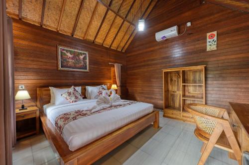 Ένα ή περισσότερα κρεβάτια σε δωμάτιο στο The Lanjang valley Bungalow
