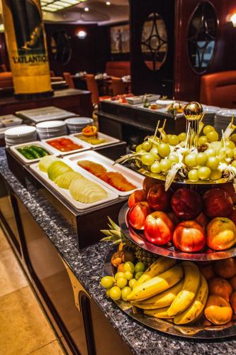 a buffet with many different types of fruits and vegetables at Seaside Park Hotel Leipzig in Leipzig