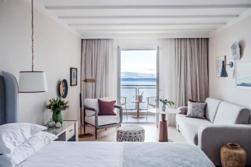 a hotel room with a bed and a view of the ocean at Amadria Park Grand Hotel 4 Opatijska Cvijeta in Opatija