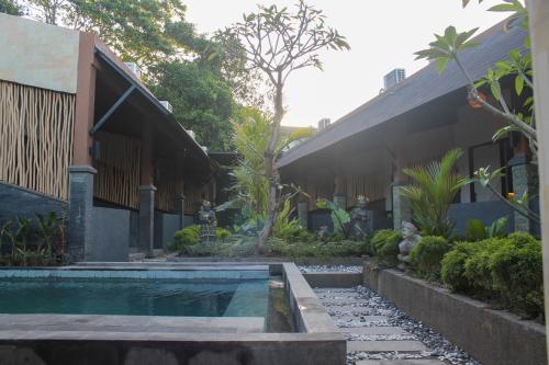 La alberca dentro o cerca de The Kantun Ungasan