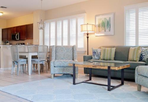 a living room with a couch and a table at Hawks Cay Resort in Marathon