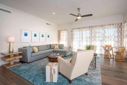 a living room with a couch and a table at Hawks Cay Resort in Marathon