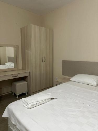 Katil atau katil-katil dalam bilik di Zeytince Apart Foça