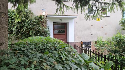 Κήπος έξω από το Kotsisa Apartament Wrocław