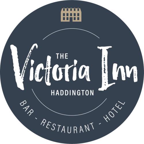 a blue circle with the victoria inn logo at The Victoria Inn in Haddington