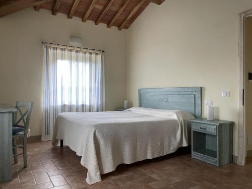 Apartment in a modern holiday home in Anghiariにあるベッド
