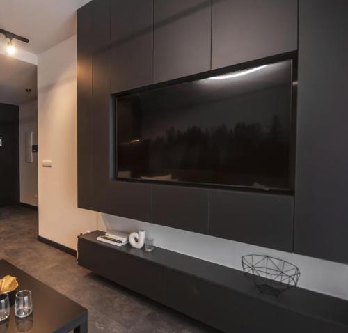 TV a/nebo společenská místnost v ubytování NG Apartments