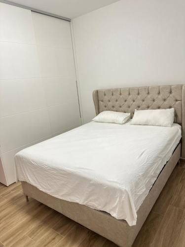 Postel nebo postele na pokoji v ubytování Vila Dusan