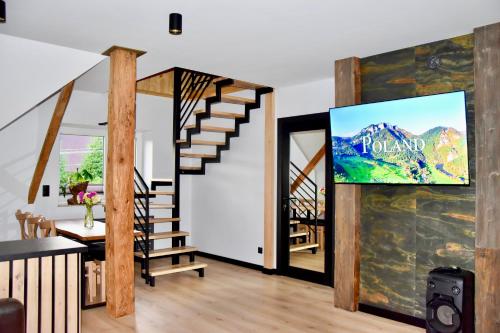 TV a/nebo společenská místnost v ubytování Apartament Nad Potokiem