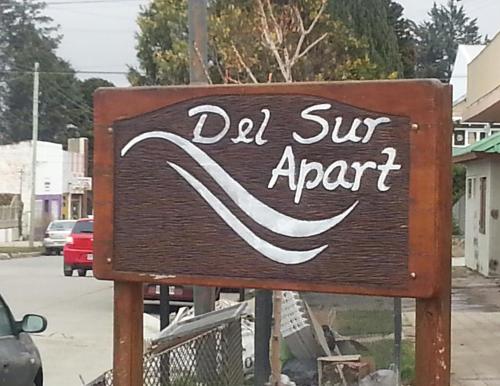 a sign for a did sul agent on a street at Del Sur Apart in Esquel