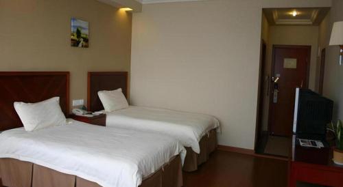 TV o dispositivi per l'intrattenimento presso GreenTree Inn Changshu South HaiYu Road Pedestrian Street Business Hotel