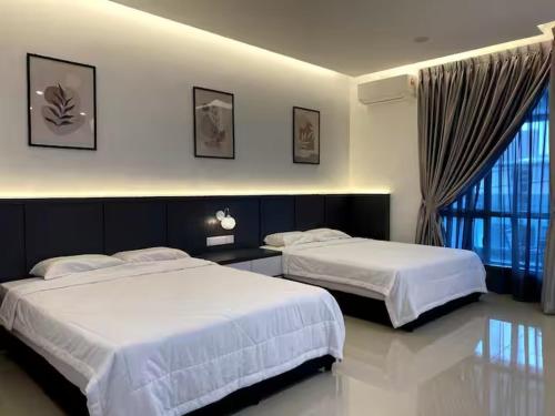 Ένα ή περισσότερα κρεβάτια σε δωμάτιο στο 38G Homestay