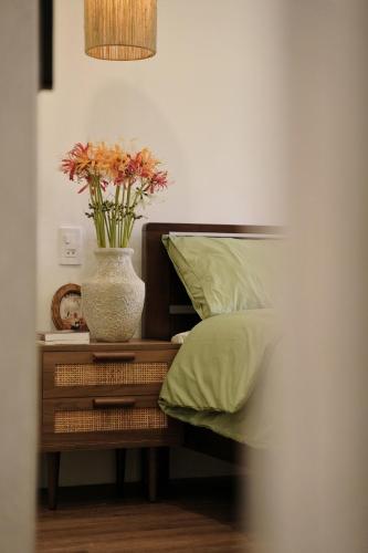 Ένα ή περισσότερα κρεβάτια σε δωμάτιο στο Lancelynk Homestay Danang