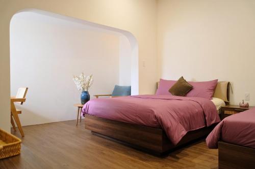 Ένα ή περισσότερα κρεβάτια σε δωμάτιο στο Lancelynk Homestay Danang