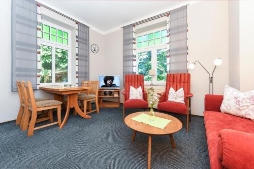 Posezení v ubytování Ferienhof Deich in Sicht