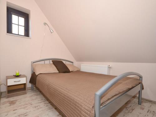 Кровать или кровати в номере Seaside Cottage in Cisowo with terrace and lovely garden