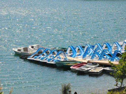 a group of boats parked at a dock in the water at Modern Villa with Pool in Montauroux France in Montauroux