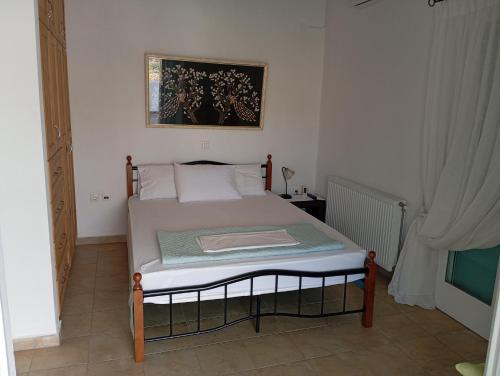 Ένα ή περισσότερα κρεβάτια σε δωμάτιο στο mastroianni house