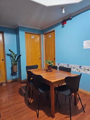 a conference room with a wooden table and chairs at Unit 302, 3rd Floor in Baguio