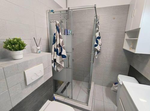 Koupelna v ubytování Platinium house