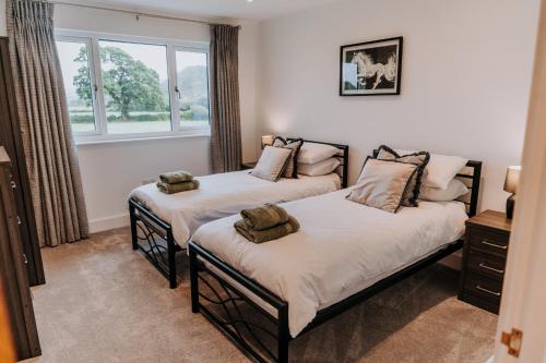 Ένα ή περισσότερα κρεβάτια σε δωμάτιο στο Modern Comfort Escape for 12 Guests -Rural Setting