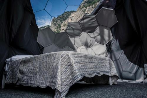 Ένα ή περισσότερα κρεβάτια σε δωμάτιο στο Bubble Room Gran Paradiso