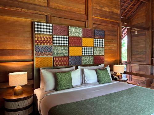 Ένα ή περισσότερα κρεβάτια σε δωμάτιο στο AnandaDara Ubud Resort & Spa