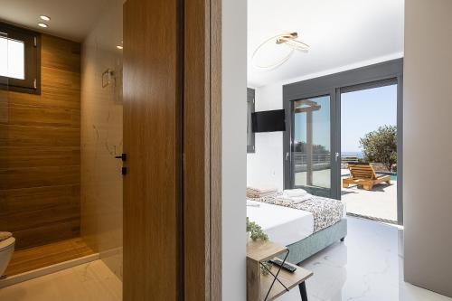 Ванная комната в Pelagria Villa, a 4-Acre Escape with Beach Access, By ThinkVilla