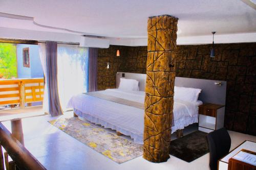 Rustiek Hotelにあるベッド