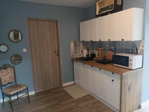 Cucina o angolo cottura di Pokoje gościnne u Ewy Białogóra