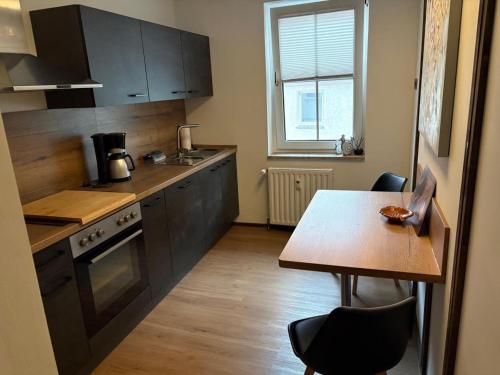 Kuchyň nebo kuchyňský kout v ubytování NEU! Ferienwohnung Stadtkern Calau