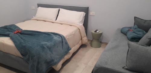 سرير أو أسرّة في غرفة في Regia Dimora