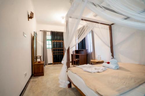 Katil atau katil-katil dalam bilik di Villa BO