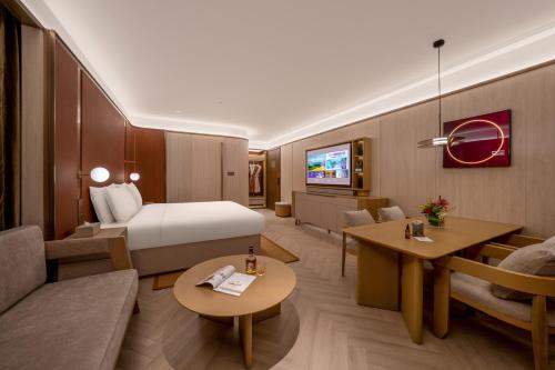 TV a/nebo společenská místnost v ubytování Orange crystal Shanghai Anting Hotel