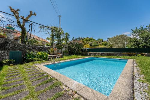 Πισίνα στο ή κοντά στο Casa do Lilau - Refúgio Rural com Piscina