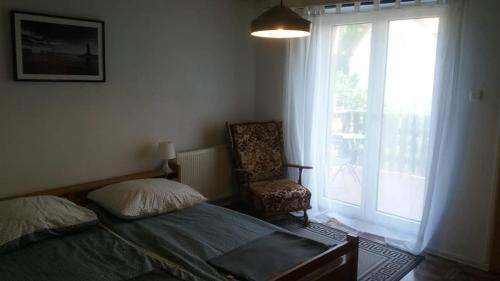 Letto o letti in una camera di Pokoje gościnne u Ewy Białogóra