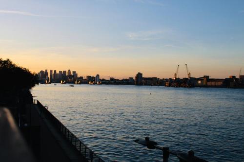 a view of a large body of water with a city at Amazing River view 2 bedroom apartment, sleeps 6 , balcony and parking in London