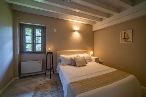 Katil atau katil-katil dalam bilik di Agriturismo Cascina Carai