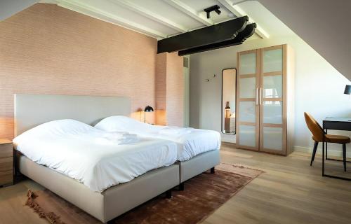 Katil atau katil-katil dalam bilik di W- 6 Hoeve Holland