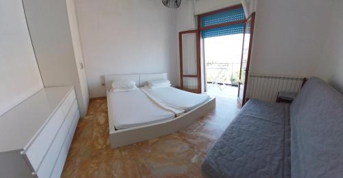 Postel nebo postele na pokoji v ubytování Appartamento Vistamare