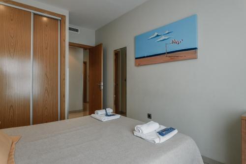 Ένα ή περισσότερα κρεβάτια σε δωμάτιο στο Aparthotel Bahía