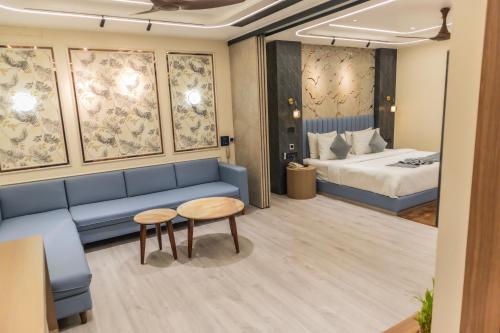 Ένα ή περισσότερα κρεβάτια σε δωμάτιο στο Narang Hotel