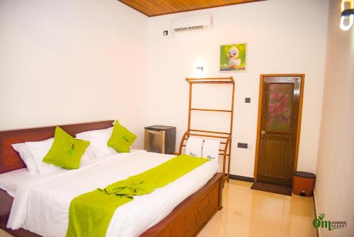 Postel nebo postele na pokoji v ubytování Om Ayurvedic Resort & Spa