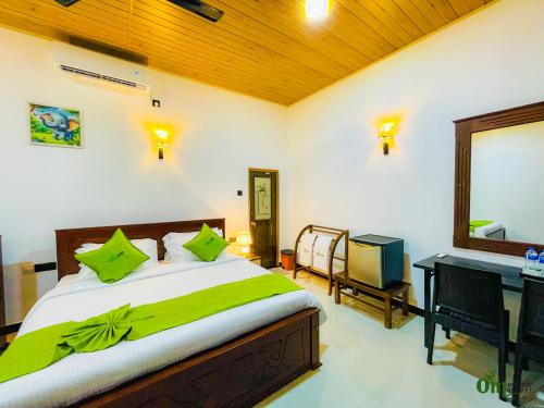 Postel nebo postele na pokoji v ubytování Om Ayurvedic Resort & Spa